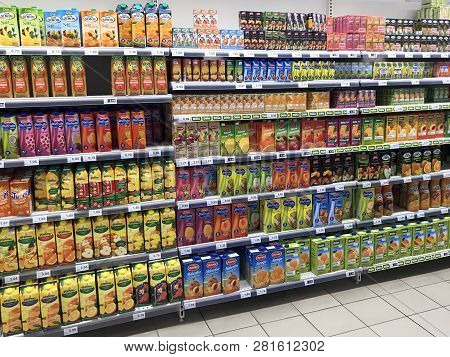 Mogan, Spain - December 31, 2018: Assortment Of Multiple Lemonade, Soja, Apple And Orange Juice Pack