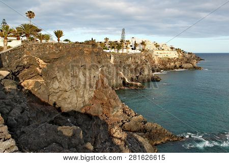Costa Del Silencio - High Volcanic Coast With Rock Formation In The Silence Bay With Clear Turquoise