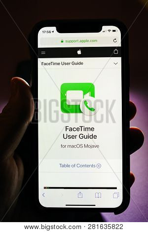 Paris, France - Jan 30, 2018: Man Holding Apple Iphone Xs With Facetime Icon And User Guide On The S