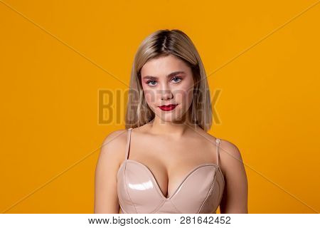 European Female Model With Blonde Hair Injoying Indoor Photoshot
