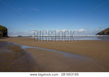 Sweeping Vista Of Mawgan Porth Beach, North Cornwall, England