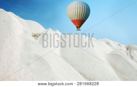 Hot air balloon flying over Cappadocia, Turkey
