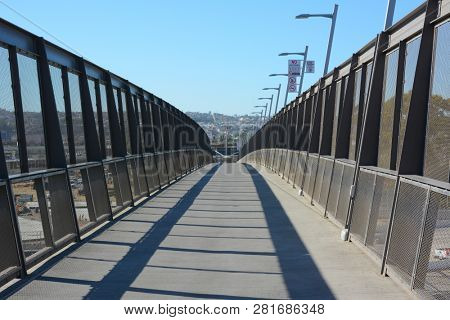 SAN YSIDRO, CALIFORNIA - N0V 26, 2018: Pedestrian bridge over the highway to the Mexoco, California border.