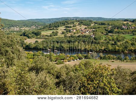 A Tourist Boats, In French Called Gabare, On The River Dordogne At La Roque-gageac, Aquitaine, Franc