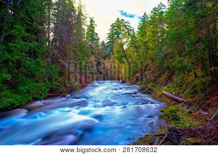 Long exposure view of water flowing on Little Qualicum Falls in Vancouver Island, Canada