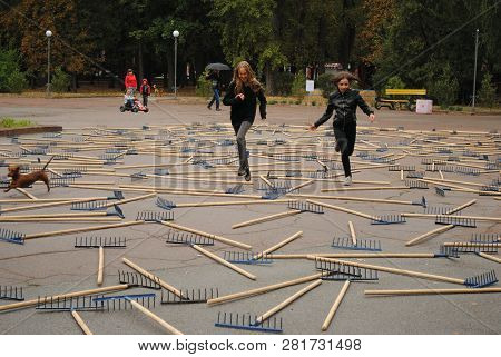 Girls Are Runing Through Art Installation, Kropyvnytskyi, Ukraine, September 1, 2017