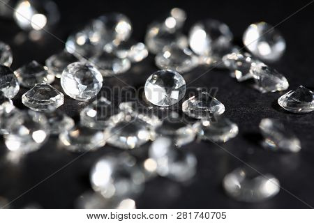 Scattering Of White Star Diamonds On Black Background Table Jeweler Concept