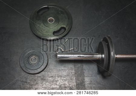 Barbell Weight With Plates Prepared On The Gym Floor For Hard Core Fitness Workout Training, View Fr