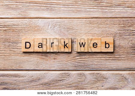 Dark Web Word Written On Wood Block. Dark Web Text On Wooden Table For Your Desing, Concept