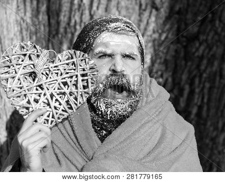 Frozen Yawning Man With Squinty Eyes , Bearded Hipster, With Beard And Moustache Covered With White 