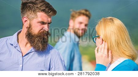 Husband Strictly Watching His Wife Looking At Another Guy While Walk. Passerby Smiling To Lady. Jeal