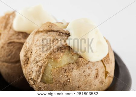 Traditional Colombian Cooked Potatoes Called Papas Saladas Topped With Mayonnaise Isolated On White