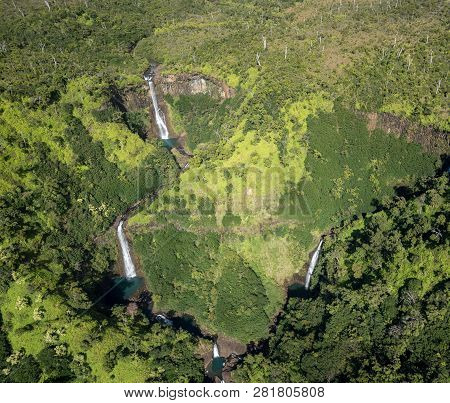 Aerial View Of Manawaiopuna Falls And Landscape Of Hawaiian Island Of Kauai From Helicopter Flight