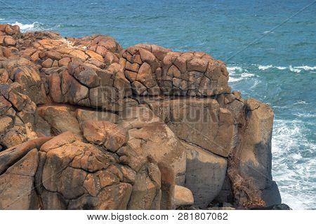 Rounded Volcanic Rock On The Coast Of Kauai Near Kapaa