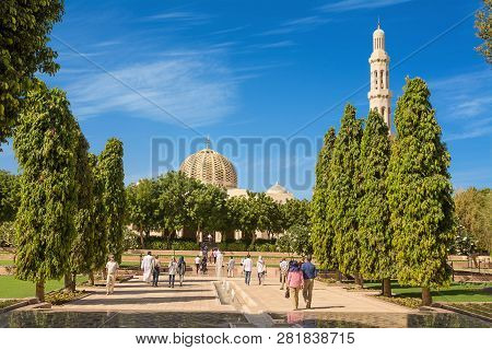 Muscat, Oman - November 4, 2018: Gardens Of The Grand Mosque Of Muscat (oman) And Tourists And Faith