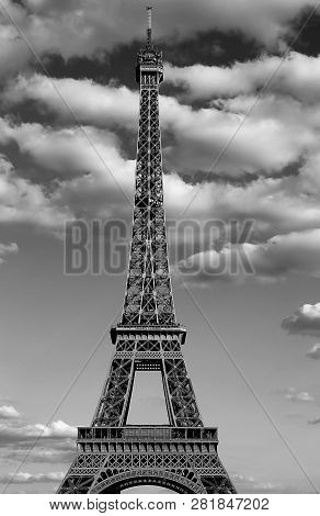 Eiffel Tower Also Called Tour Eiffel In French Language With Black And White Effect And Many Clouds