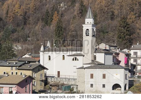 Church In A Coutryside With Many Houses And Trees Composition