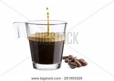 Black Coffee In Glass Cup With Coffee Beans And  Jumping Drop On White Background