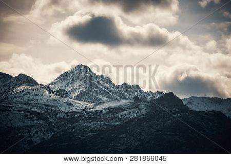 Snow Capped Mountain Peak Of Monteo San Parteo In The Balagne Region Of Corsica