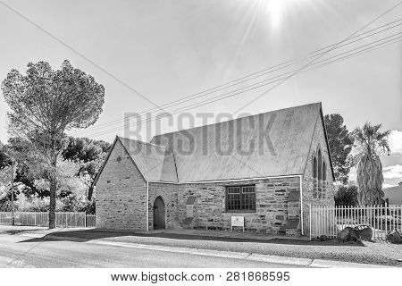 Fraserburg, South Africa, August 7, 2018: A Monochrome Street Scene, With The Afrikaans Protestant C
