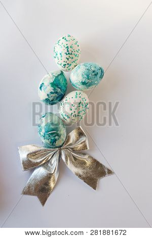 Easter Background With Easter Blue Eggs . Isolated On White. Top View With Copy Space.