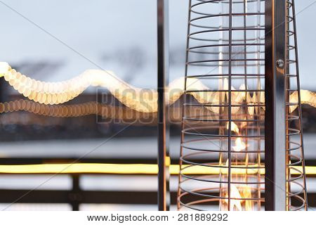 Fire, Warm, Warms Fire On The Background Of The City, Gas Lampa In A Street
