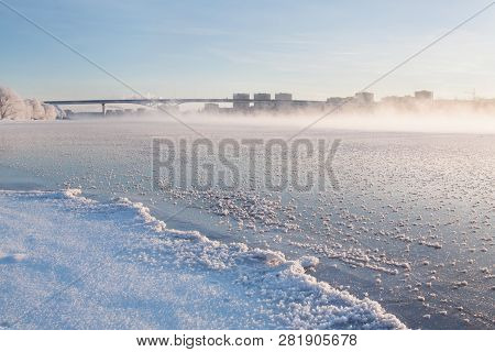 Winter Landscape In The Early Morning Overlooking The City Of Dubna And The Bridge Over The Volga. F