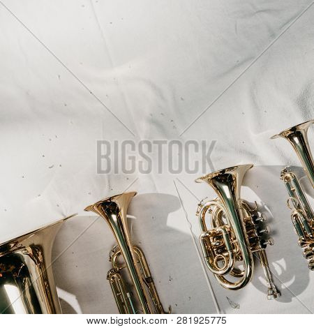 Musical Instruments (horns) Put In A Blanket With Sunlight From A Window