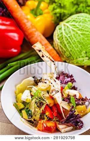 Fattoush Salad With Different Vegetables On White Plate