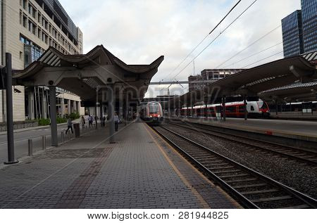 Platform and train view on Oslo central station. Oslo Central Station (Sentralstasjon) is main railway station in Oslo. June 17. 2018. Oslo,Norway