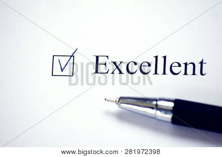 Checklist With A Word Exellent On White Paper. Checkbox Concept.