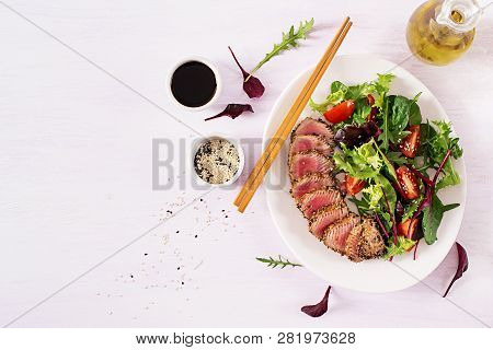 Japanese Traditional Salad With Pieces Of Medium-rare Grilled Ahi Tuna And Sesame With Fresh Vegetab