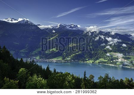 View Of Lake Thun And Bernese Alps Including Jungfrau, Eiger And Monch Peaks From The Top Of Niederh