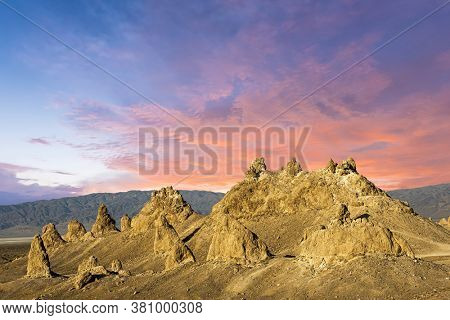 Trona Pinnacles are nerarly 500 tufa spires hiddeen in California Desert National Conservation Area, not far from the Death Valley National Park, California, USA. Sunset