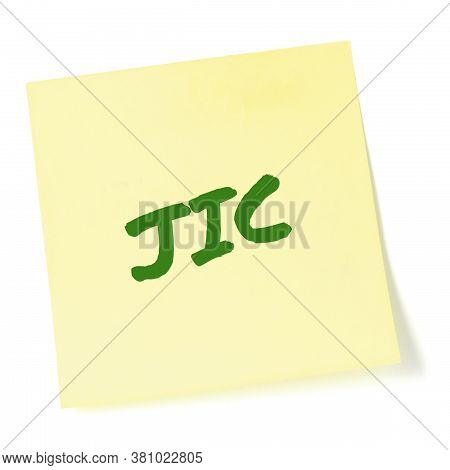 Just in case initialism JIC green marker written acronym text, isolated yellow to-do list sticky post-it note reminder abbreviation sticker macro closeup, memo information message.