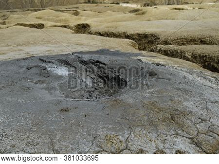 Mud Geyser Or Mud Volcano. Geological Formation. Particular Hydrogeological Conditions Generally All