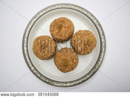 Closeup Of Popular Indian Sweet Balls Laddu Or Ladoo Made From Chapati Roti Powdered Mashed And Made