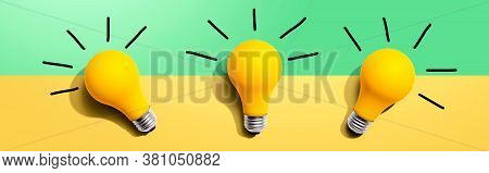 Three Yellow Light Bulbs - Flat Lay From Above