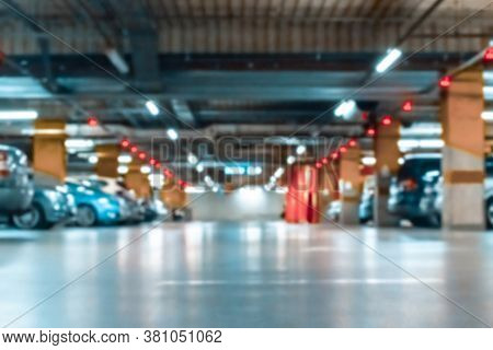 Parking Car Blurred. Empty Road Asphalt Background In Soft Focus. Car Lot Parking Space In Undergrou