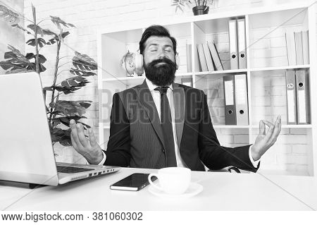 Keep Calm And Meditate. Bearded Man Meditate At Workplace. Manager Sit In Meditation Pose. Concentra