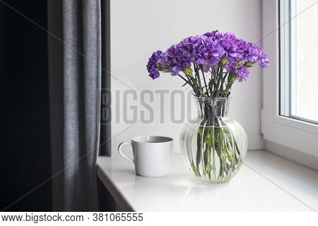 Bridal Bouquets Of Lilac Carnations In A Round Glass Vase Different Sizes As Table Decoration