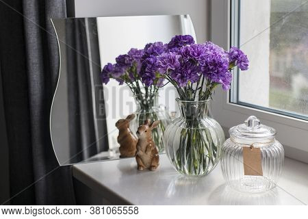 Bridal Bouquets Of Lilac Carnations In A Round Glass Vase Different Sizes As Table Decoration