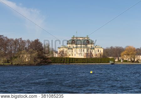 Drottningholm, Sweden - April 21 2019: The View Of Drottningholm Palace Seeing From Water On April 2