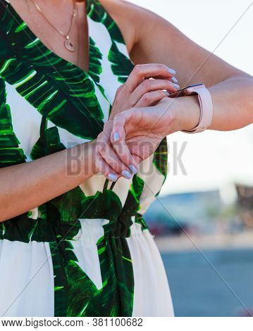 Female Touching Her Smartwatch. Detail View Tech Gear.