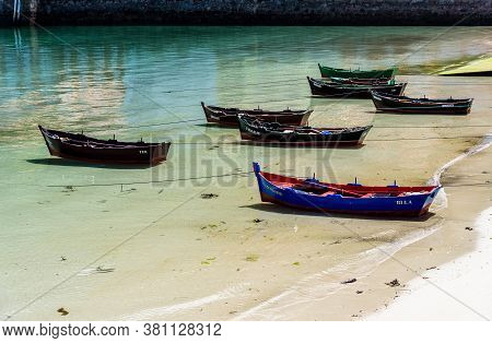 Santiago De Compostela, Spain - July 19, 2020: Boats In The Harbour Of O Pindo, A Picturesque Villag