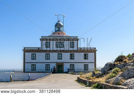 Finisterre, Spain - July 19, 2020: The Lighthouse Of Cape Of Finisterre In Costa Da Morte Or Death C