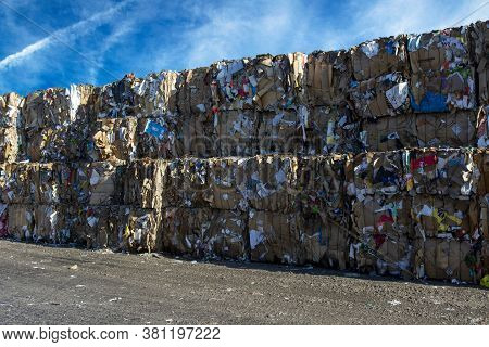 Sweden, Orebro, 24.02.2020: Bales Of Cardboard And Box Board. Waste Paper For Recycling. Background 