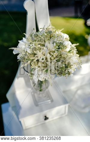 White Luxurious Wedding Bouquet Of Lilies Of The Valley, Astilba, Astrantia And Sweet Peas On White 