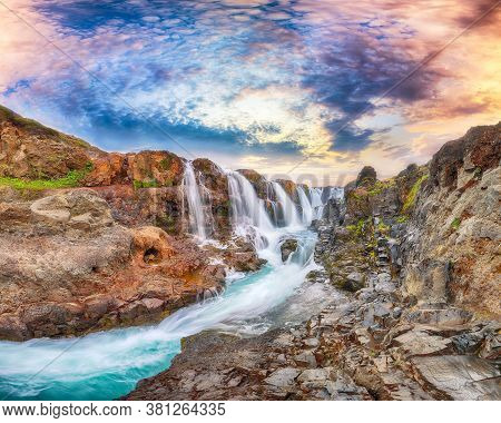 Breathtaking View Of  Kolufossar Waterfall At Sunset.  Popular Tourist Travel Destination In Iceland