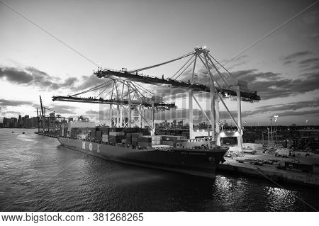 Miami, Usa - March 01, 2016: Freight Boat Mol Expeditor In Cargo Port. Container Ship And Cranes Ill